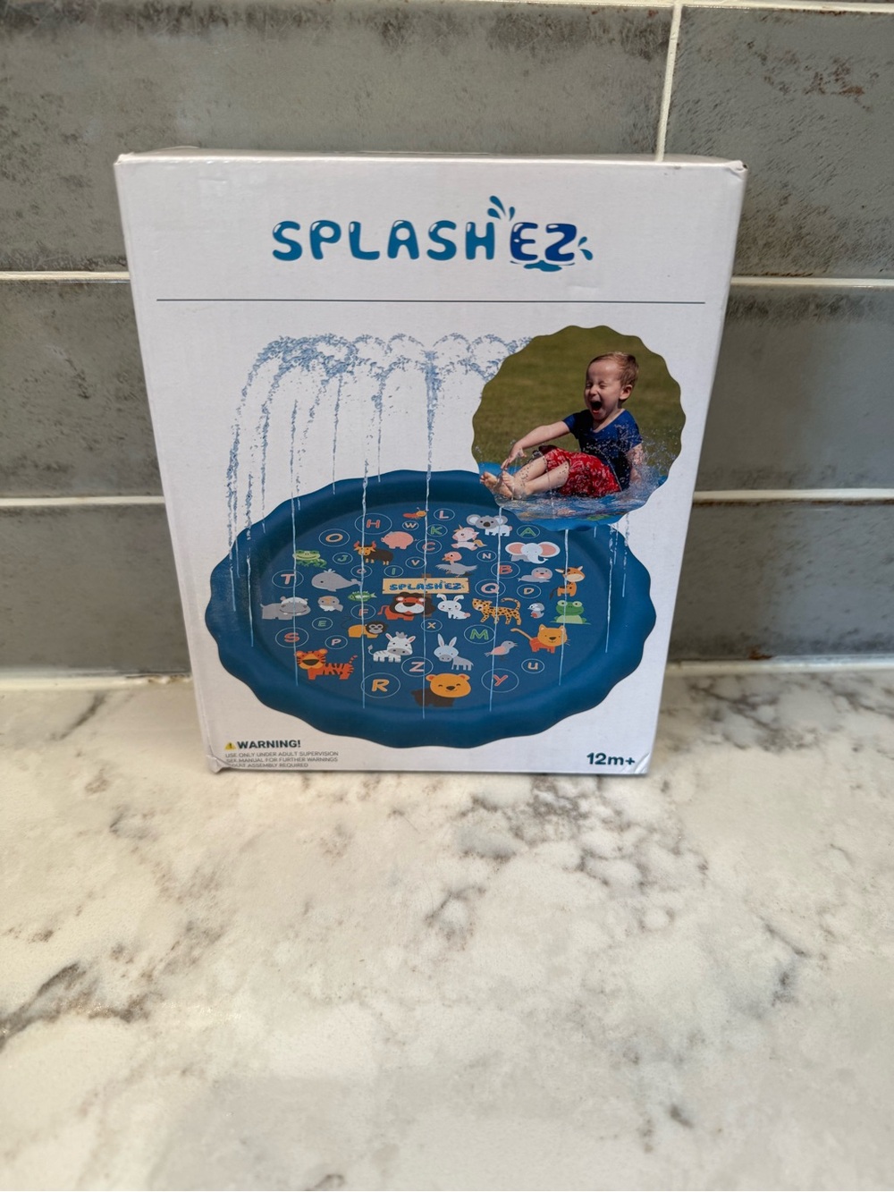 Splash Blue Inflatable Kiddie Splash Pad with Animal Graphics